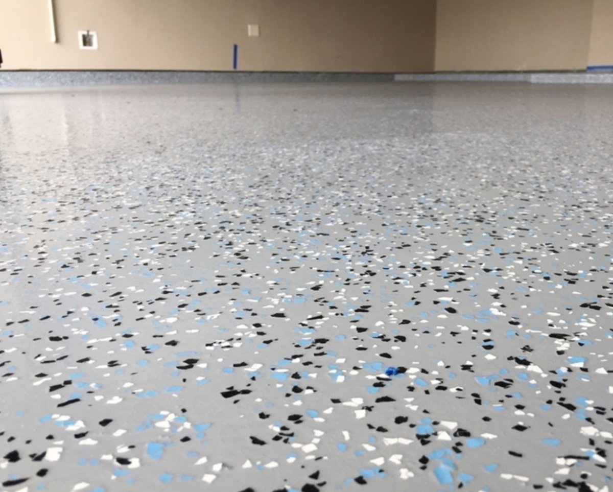 Speckled epoxy garage floor finish installed by L&J Painting Group